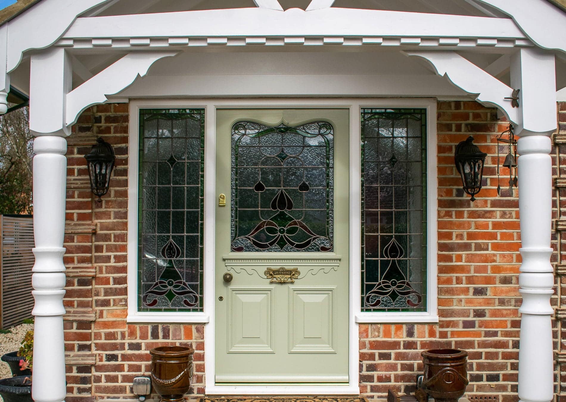 bespoke Edwardian front door with stained glass. Antique brass door furniture