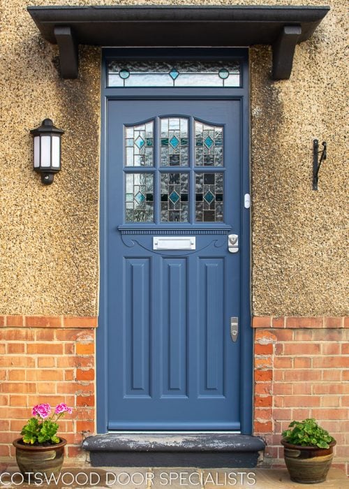 1930's Grey spray painted six light front door. Door with stained and leaded glass as double glazed units. Door furniture satin chrome with banham locks