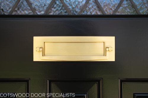 Satin brass door furniture lock in bespoke 1930s front door