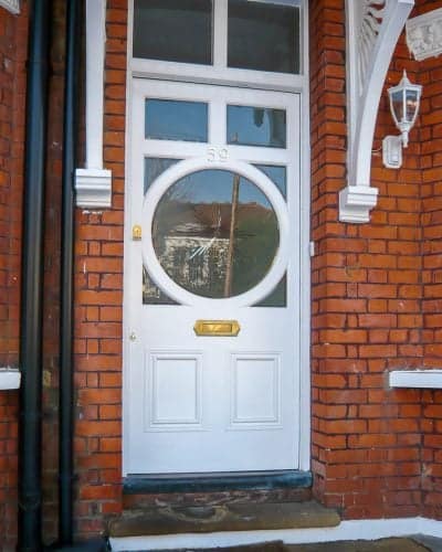 Circular glazed Edwardian door. Sandblasted glass with brilliant cut clear star. Door painted white