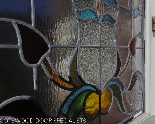 Edwardian 5 panel front door. Door with new frame. Stained glass to door and frame. Painted finish. Close up of stained glass