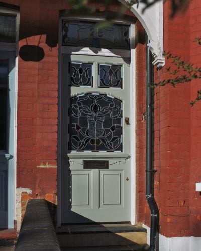 Edwardian 5 panel front door. Door with new frame. Stained glass to door and frame. Painted finish