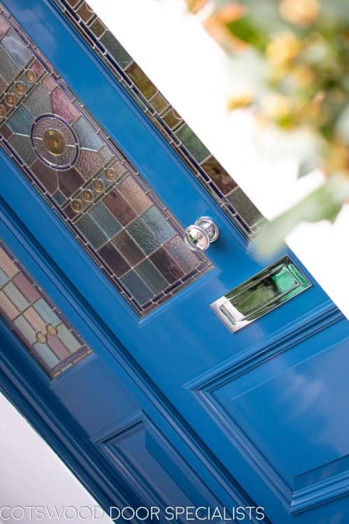 xtra wide Victorian front entrance door with double side panels. Painted dark blue
