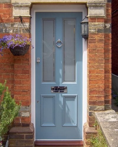 Four panel door with etched glass painted light blue