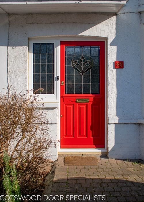Late Edwardian red front door and sidelight frame. Door painted bright red. Stained glass in door and frame