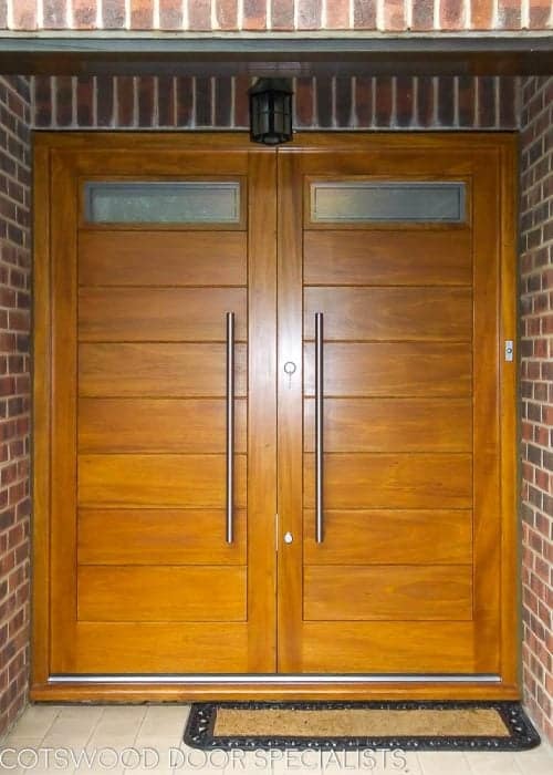 Contemporary glazed double doors. Modern appearance with satin chrome door furniture