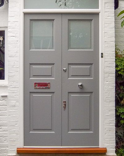 Modern grey double doors. Contemporary wooden front doors painted grey. Etched glass with clear line detail. Polished chrome door furniture. New door frame with number in glass above door