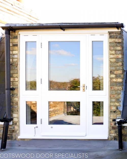 Balcony french door made in Accoya wood and painted white. Clear double glazed glass and satin chrome door fittings. Fitted into a London balcony