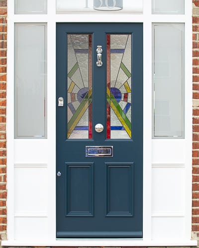 Art Deco front door and double sidelight fanlight frame. Beautiful dark blue painted door and frame painted white. Art Deco stained glass in the door and etched glass in the door frame. Polished chrome door furniture.