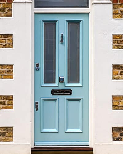 Art Deco Victorian door. 4 panel door painted green with sandblasted glass leaving a clear inset border. Art deco polished chrome door furniture. Number in transom above door