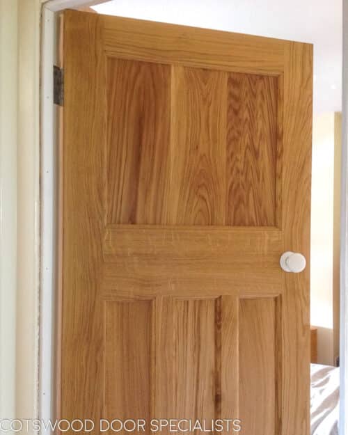 European Oak 1930's internal door. Solid oak door with beautiful grain showing. White porcelain door knob