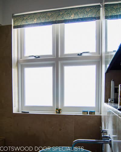 1920s Casement window. 1920's style wooden window fitted into bathroom. Window has modern locks, draught proofing and double glazed glass