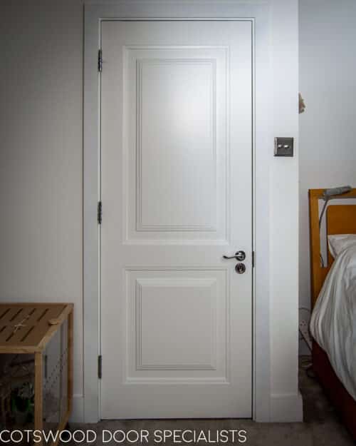 Bedroom fire door. Bespoke wooden fire rated bedroom door with raised panels