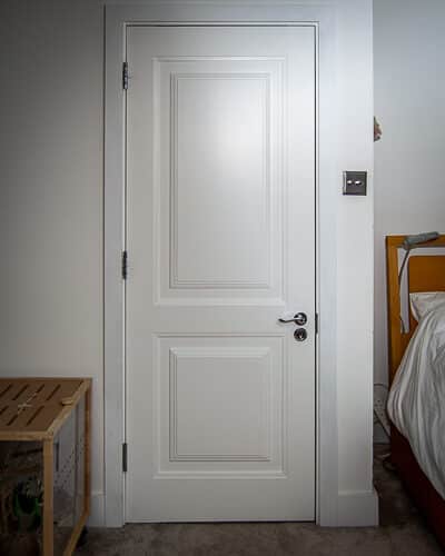 Bedroom fire door. Bespoke wooden fire rated bedroom door with raised panels