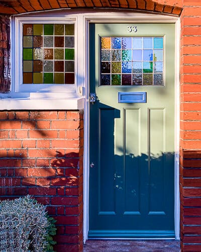 Early 1920s door. Simple styled 1920s front door with leaded oblong stained glass. Fitted into a red brick edwardian house