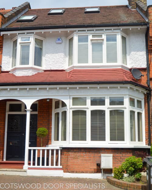 Edwardian bay windows. Edwardian london home with 3 casement bay windows in white painted wood. Window have decorative curved glass. Opening windows have locking system and are all fully double glazed
