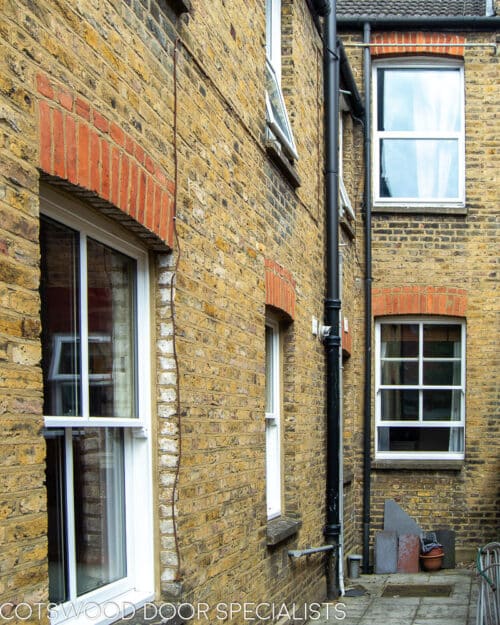 Victorian sash windows. A series of double glazed wooden sash windows fitted into a London home. White painted windows